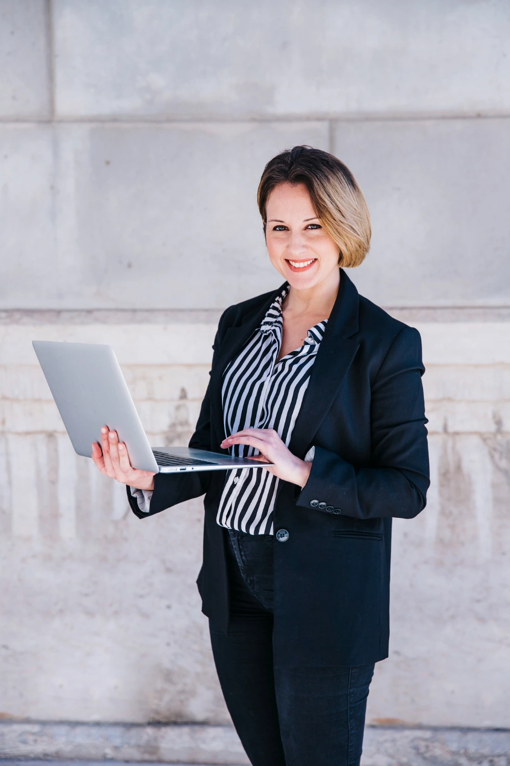 professional woman working on a laptop